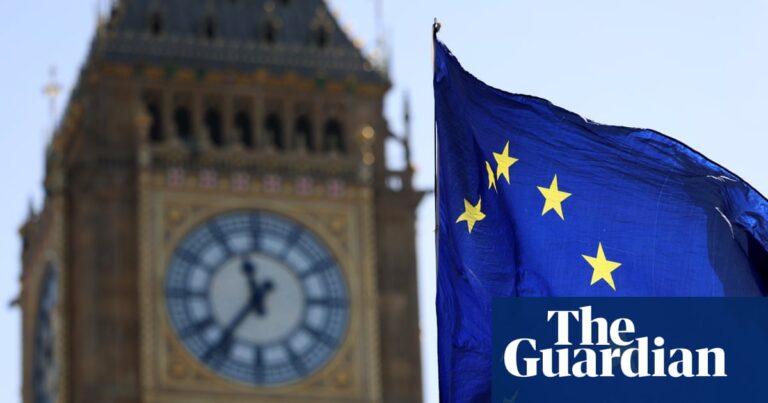 An EU flag flies in the wind outside Big Ben in London